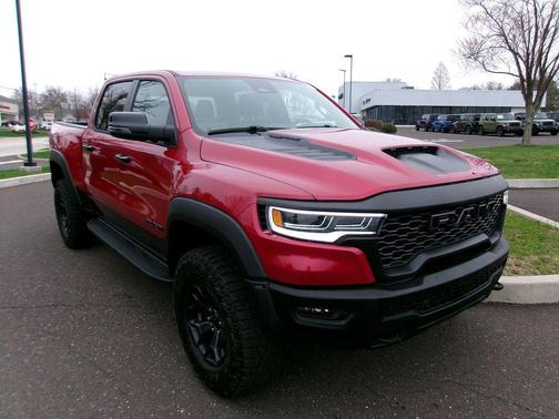 Molten Red Pearlcoat 2026 RAM 1500 RHO Crew Cab 4x4 5'7' Box
