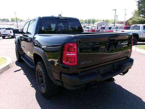 Diamond Black Crystal Pearlcoat 2026 RAM 1500 RHO Crew Cab 4x4 5'7' Box