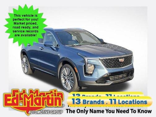 Deep Sea Metallic 2024 Cadillac XT4 Premium Luxury