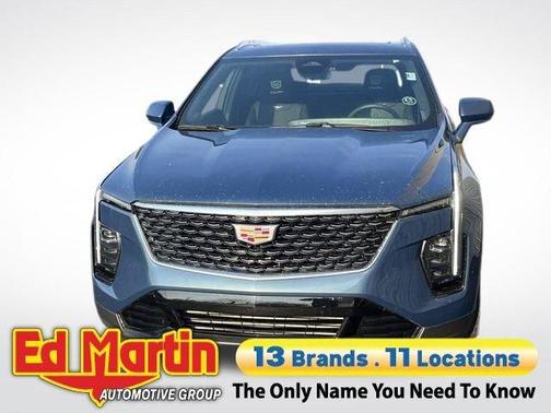 Deep Sea Metallic 2024 Cadillac XT4 Premium Luxury