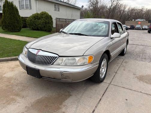 Light Parchment Gold Clearcoat Metallic 1999 Lincoln Continental Base 4dr Sedan
