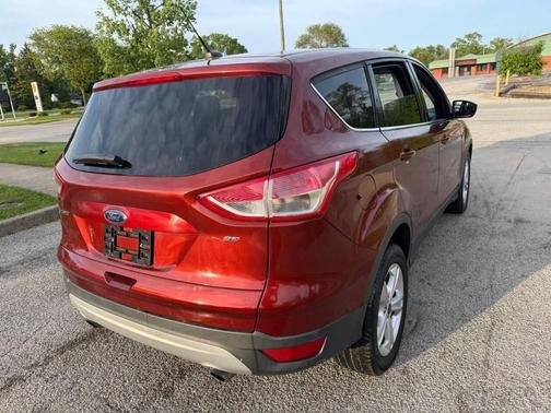 Ruby Red Metallic Tinted Clearcoat 2016 Ford Escape SE
