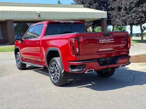 Volcanic Red Tintcoat 2025 GMC Sierra 1500 AT4
