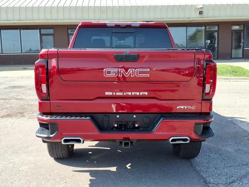 Volcanic Red Tintcoat 2025 GMC Sierra 1500 AT4