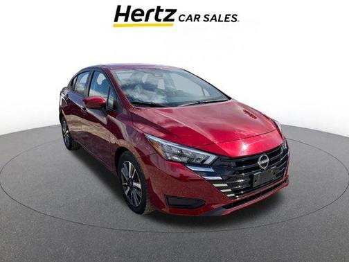 Scarlet Ember 2025 Nissan Versa 1.6 SV