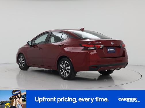 Red 2025 Nissan Versa SV