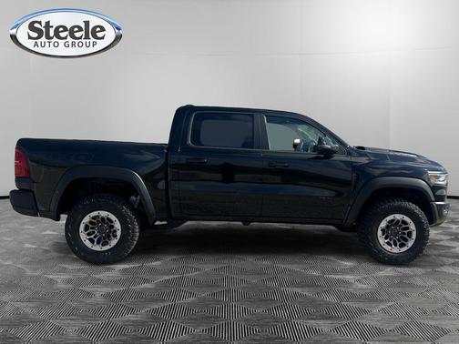 Diamond Black Crystal Pearlcoat 2026 RAM 1500 RHO Crew Cab 4x4 5'7' Box