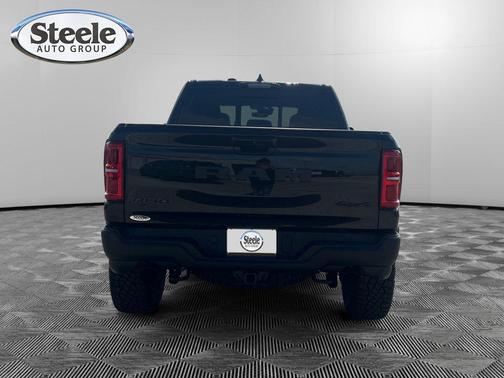 Diamond Black Crystal Pearlcoat 2026 RAM 1500 RHO Crew Cab 4x4 5'7' Box