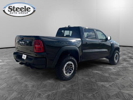 Diamond Black Crystal Pearlcoat 2026 RAM 1500 RHO Crew Cab 4x4 5'7' Box