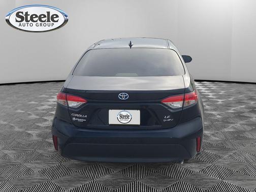 Midnight Black Metallic 2025 Toyota Corolla Hybrid LE