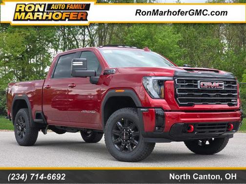 Volcanic Red Tintcoat 2026 GMC Sierra 2500 AT4