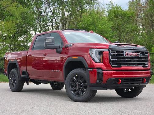 Volcanic Red Tintcoat 2026 GMC Sierra 2500 AT4