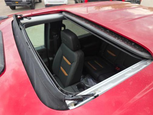 Volcanic Red Tintcoat 2026 GMC Sierra 2500 AT4