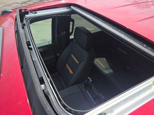 Volcanic Red Tintcoat 2026 GMC Sierra 2500 AT4