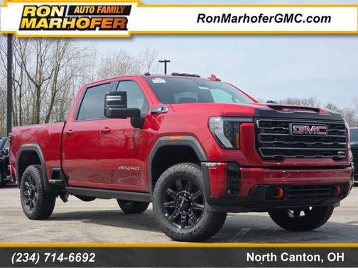 Volcanic Red Tintcoat 2026 GMC Sierra 2500 AT4