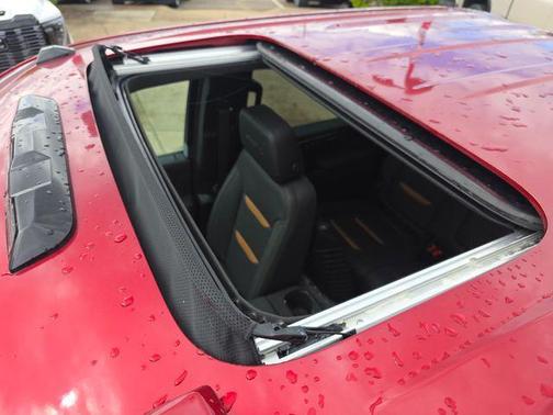 Volcanic Red Tintcoat 2026 GMC Sierra 3500 AT4