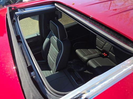 Volcanic Red Tintcoat 2026 GMC Sierra 1500 AT4X