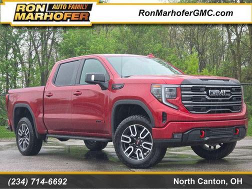 Volcanic Red Tintcoat 2026 GMC Sierra 1500 AT4