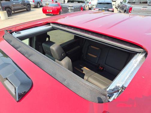 Volcanic Red Tintcoat 2026 GMC Sierra 3500 AT4