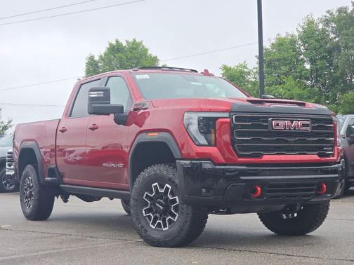 Volcanic Red Tintcoat 2026 GMC Sierra 2500 AT4X