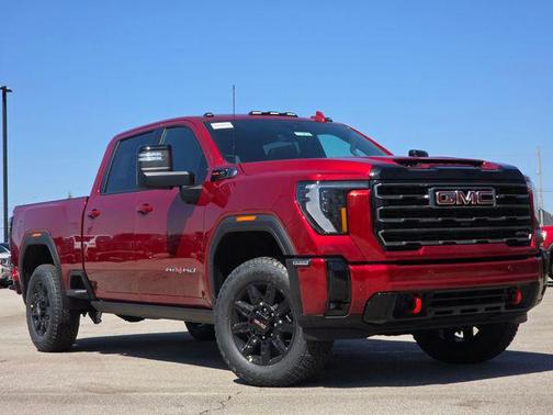 Volcanic Red Tintcoat 2026 GMC Sierra 2500 AT4