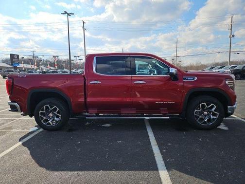 Volcanic Red Tintcoat 2026 GMC Sierra 1500 SLT