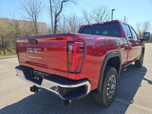 Volcanic Red Tintcoat 2026 GMC Sierra 2500 SLT
