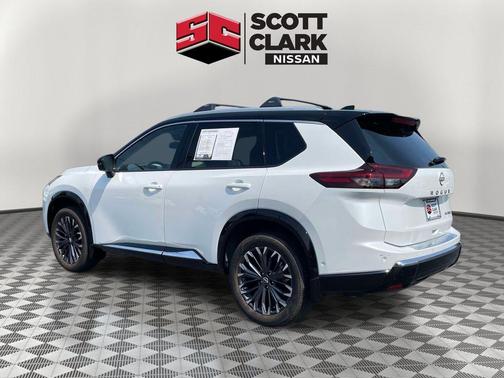 Everest White Pearl/Super Black 2025 Nissan Rogue Platinum