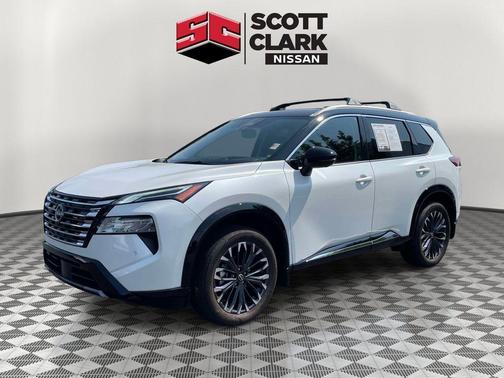 Everest White Pearl/Super Black 2025 Nissan Rogue Platinum
