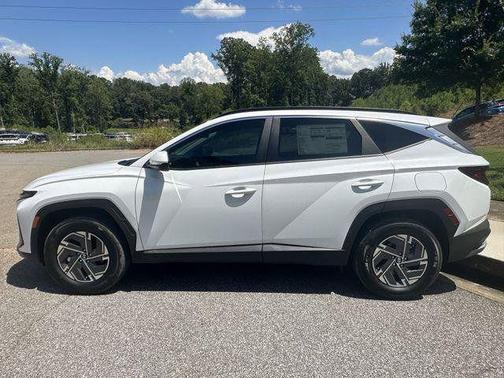 Creamy White Pearl 2025 Hyundai TUCSON Hybrid Blue