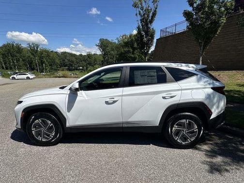 Creamy White Pearl 2025 Hyundai TUCSON Hybrid Blue