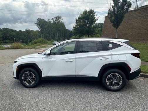 Creamy White Pearl 2025 Hyundai TUCSON Hybrid Blue