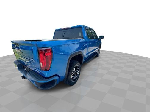 Dynamic Blue Metallic 2024 GMC Sierra 1500 4WD Crew Cab 147" AT4
