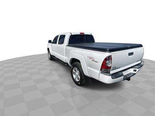 Super White 2013 Toyota Tacoma 2WD Double Cab LB V6 AT PreRunner (Natl)