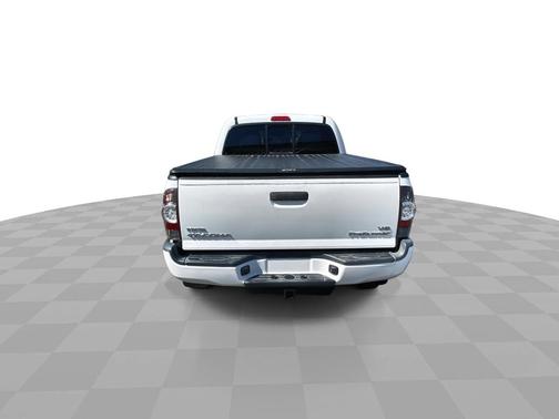 Super White 2013 Toyota Tacoma 2WD Double Cab LB V6 AT PreRunner (Natl)