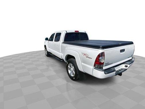 Super White 2013 Toyota Tacoma 2WD Double Cab LB V6 AT PreRunner (Natl)