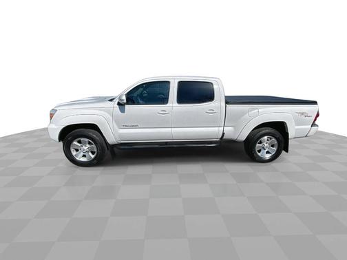 Super White 2013 Toyota Tacoma 2WD Double Cab LB V6 AT PreRunner (Natl)