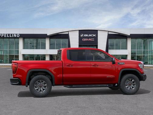 Volcanic Red Tintcoat 2026 GMC Sierra 1500 4WD Crew Cab 147" AT4X