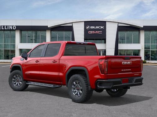 Volcanic Red Tintcoat 2026 GMC Sierra 1500 4WD Crew Cab 147" AT4X