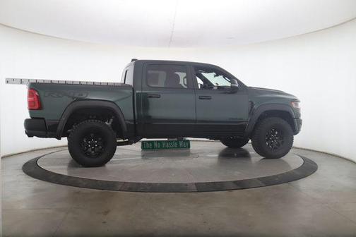 Serrano Green Metallic 2026 RAM 1500 RHO Crew Cab 4x4 5'7' Box