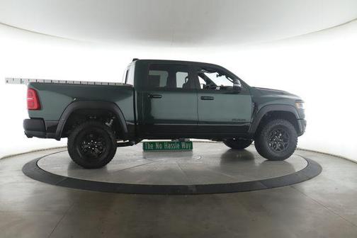 Serrano Green Metallic 2026 RAM 1500 RHO Crew Cab 4x4 5'7' Box