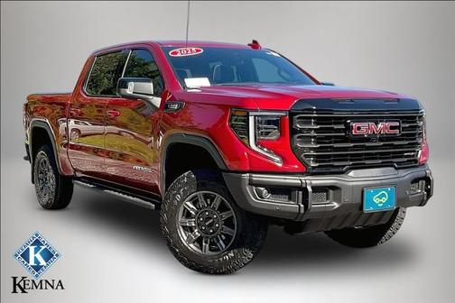 Volcanic Red Tintcoat 2025 GMC Sierra 1500 AT4X