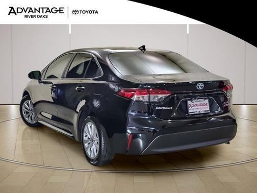 Midnight Black Metallic 2024 Toyota Corolla Hybrid SE