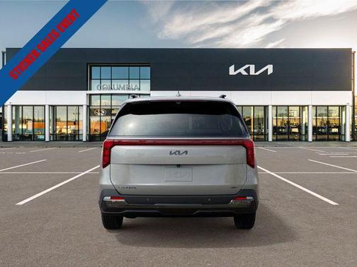 Ivory Silver 2026 Kia Carnival Hybrid SX