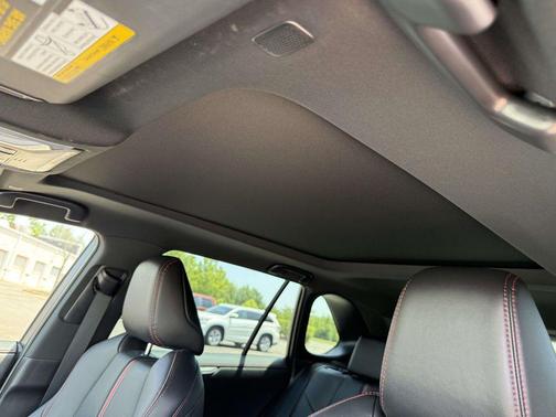 Wind Chill Pearl/Midnight Black Metallic 2025 Toyota RAV4 Hybrid SE