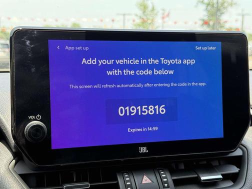 Wind Chill Pearl/Midnight Black Metallic 2025 Toyota RAV4 Hybrid SE