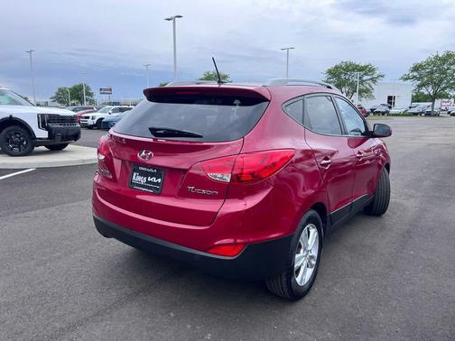 Garnet Red 2010 Hyundai TUCSON GLS
