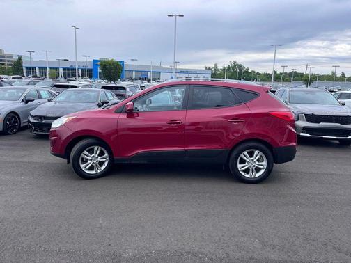 Garnet Red 2010 Hyundai TUCSON GLS