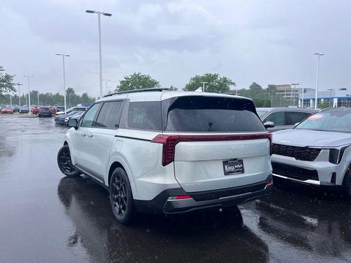 Ivory Silver 2025 Kia Carnival SX Prestige