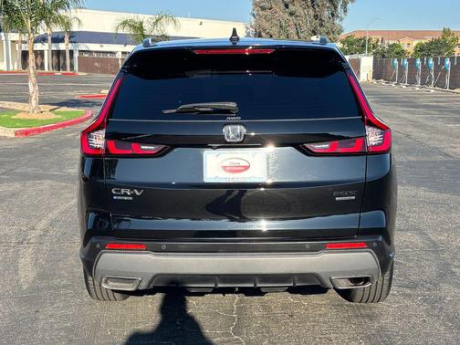 Crystal Black Pearl 2025 Honda CR-V Hybrid Sport Touring AWD
